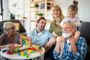 Senior Grandparents Playing With Grandchildren