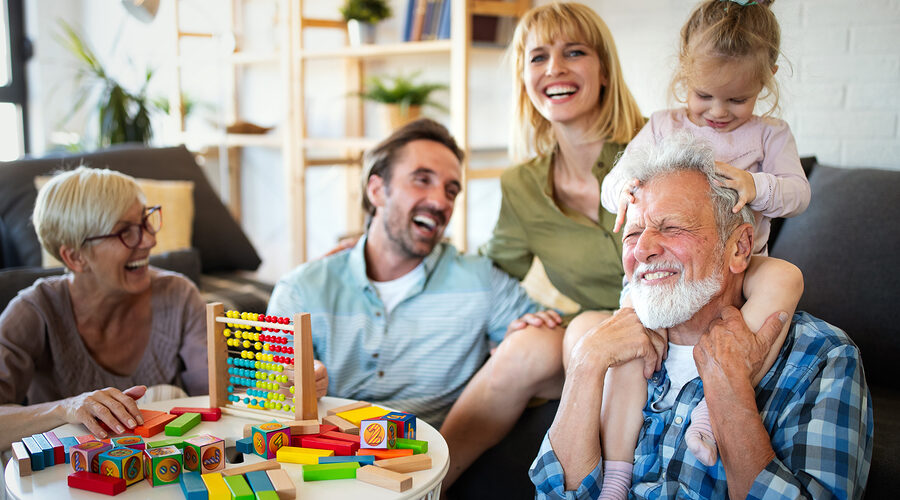 Senior Grandparents Playing With Grandchildren